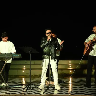 Performing with my full band allows us to create a rich, powerful sound for larger events and concerts. This setup includes live keyboards, guitar, and percussion to bring a complete musical experience.