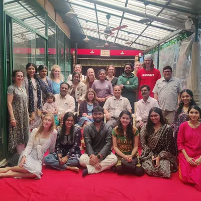 A group photo with students from Creighton University and St. Joseph's College after a fulfilling cultural session. Our indoor space is designed to be open and welcoming for group interactions and learning.