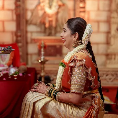 The beautiful bride, Sonal Monteiro, on her wedding day. I had the privilege of designing her stunning red and gold muhurtham blouse, which was filled with intricate zardosi work.