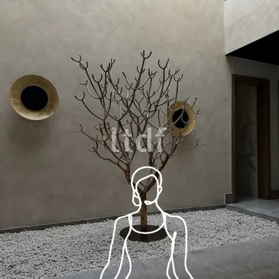 The beauty of design is that even in its most minimal state, it can feel complete. Here, balanced proportions, a sculptural tree, and thoughtful detailing create a space that is calm, intentional, and quietly distinctive.