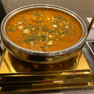 Our Paneer Butter Masala features soft paneer cubes simmered in a luscious, tangy tomato and cream gravy. It is a classic dish that is loved by guests of all ages.