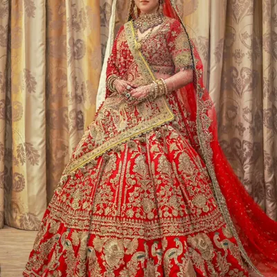 A full view of this magnificent Rimple and Harpreet bridal lehenga. My focus was on the double dupatta draping, creating a royal silhouette that was both traditional and stunningly beautiful for her Nikkah.
