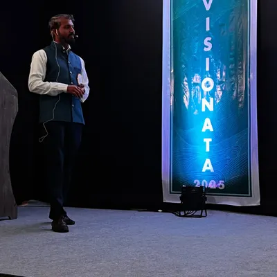 On stage at 'Visionata,' an event hosted by Dr. B Hirey College of Architecture. I feel completely in my element when I get to connect with an audience of young, creative minds and share my passion for art.