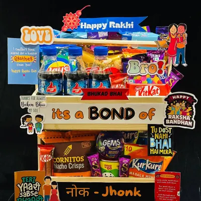 This "Bond of Nok-Jhonk" hamper is a bestseller, filled with snacks and quirky messages that celebrate the fun banter between siblings. It’s a perfect mix of treats and memories for your Raksha Bandhan celebration.