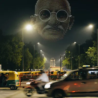 A highly detailed portrait of Mahatma Gandhi, the Father of the Nation, created with drones over Delhi. This demonstrates my ability to render recognizable and respectful portraits on a massive scale.