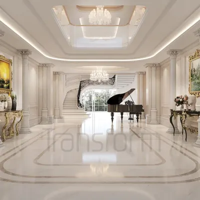 This foyer serves as the home's overture, where natural light, classical columns, and a grand piano create an immediate sense of splendor. The design guides the eye upward, celebrating openness and architectural grace.