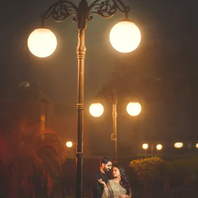 Under the soft glow of city lights, we create pure magic. This night portrait showcases my expertise in using ambient light to craft a moody, romantic, and unforgettable scene.