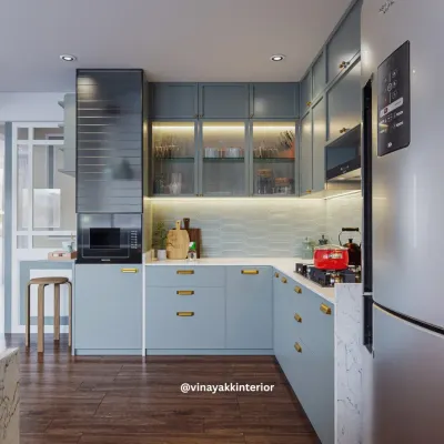 A modern kitchen should be as beautiful as it is functional. For this project, I chose calming powder-blue cabinets with sleek gold handles for a contemporary look. Features like fluted glass shutters and under-cabinet lighting add both style and practicality.