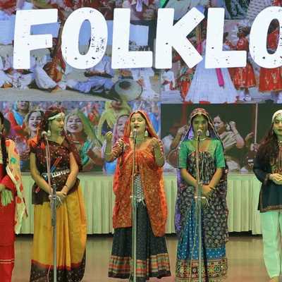 Performing a Rajasthani folk song with my group, dressed in traditional attire for a G20 event. I can organize and perform folk music for culturally themed events.