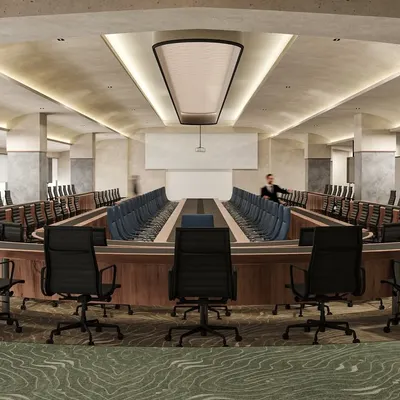 This is the final 3D render of a large, state-of-the-art conference hall. The U-shaped layout, integrated screens, and sophisticated lighting are designed to facilitate large-scale meetings and executive presentations.