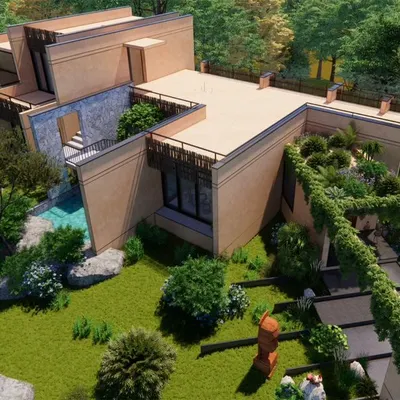 An aerial view of the Earth Abode farmhouse, showing how the architecture is broken into smaller volumes that follow the contours of the land, with green roofs and pathways that merge the structure with the landscape.