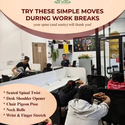 Your spine and sanity will thank you. This image from a corporate session highlights simple, effective moves like seated spinal twists and desk shoulder openers that I teach employees to combat the effects of sitting all day.
