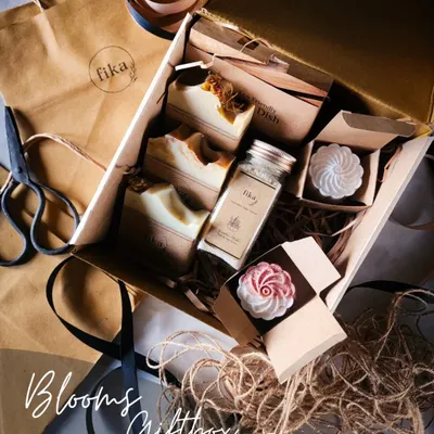 This is my 'Blooms' Giftbox, a curated set that shows luxury shouldn't cost the Earth. Inside, you'll find artisan soaps, bath salts, and whimsical meringue-shaped soaps, all packed with biodegradable materials.