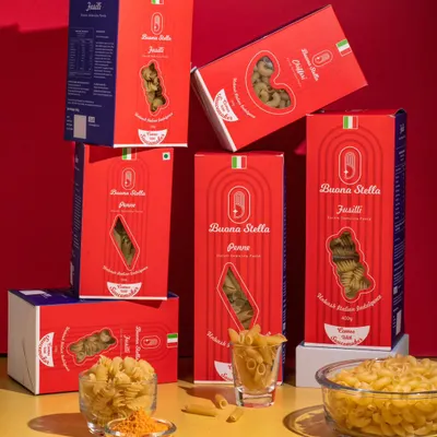A group shot of Buona Stella's pasta packaging. We arranged the boxes in a dynamic, stacked composition to create a visually interesting and comprehensive product lineup for the brand.