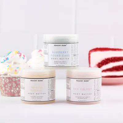 I'm launching my new range of super hydrating body butters. This image shows all three variants: Blueberry Pound Cake, Red Velvet, and Toasted Vanilla, perfect for keeping dry winter skin at bay.