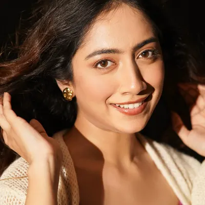 A happy and radiant portrait. I created a simple, glowing makeup look with soft, natural hair to capture a feeling of warmth and effortless beauty.