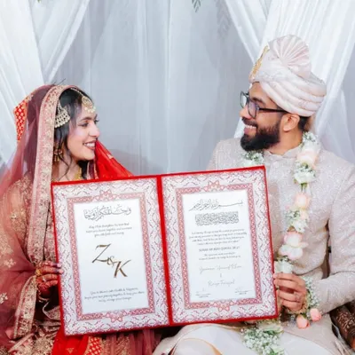 The moment it becomes official. I love how they look at each other, holding their personalized Nikah nama. This is what it's all about for me.