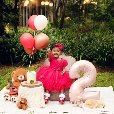 Two years of pure sweetness! Milestone birthdays are such a joy to celebrate. I create fun, themed setups like this outdoor picnic to capture the personality and excitement of your little one's special day.