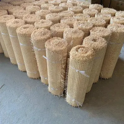 A view of our warehouse stock of export-grade cane webbing rolls. We supply these materials in bulk for large-scale interior projects, including custom wall paneling, cabinet inserts, and furniture manufacturing for our B2B clients.