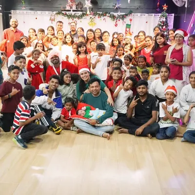 The whole Zumbamania family together for our Christmas celebration. We believe in creating a strong community, and events like these bring kids, parents, and instructors together for a great time.