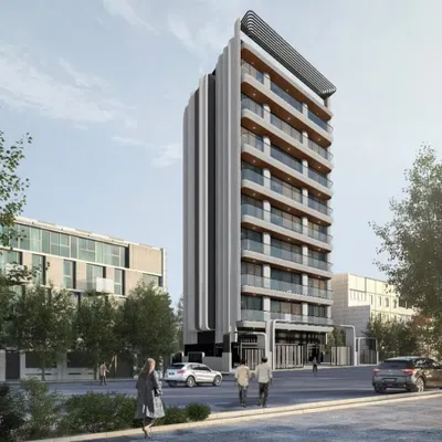 A render of the Irena Apartments, a residential redevelopment project. The design transforms a simple geometric block into a functional and elegant living space, with a facade defined by vertical fluted panels and soft, curved balconies.