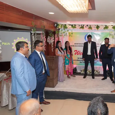 On stage during a formal corporate event for Abam Engineers. My role is to ensure the program flows seamlessly, from welcoming guests to introducing award winners.