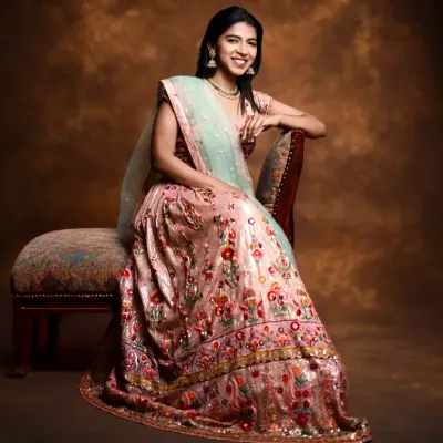 This gorgeous floral embroidered lehenga in shades of pink with a mint green dupatta is a client favorite for sangeet events or daytime weddings. It's light, happy, and incredibly photogenic.