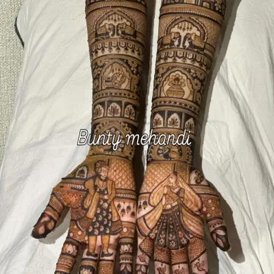 A beautiful depiction of Radha and Krishna, a popular and auspicious theme for bridal mehendi, showcasing fine lines and expressive figures on the palms.