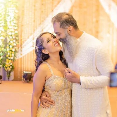 A tender and joyful moment from a 50th-anniversary celebration, showing that love and romance are truly timeless.
