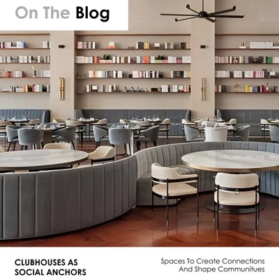 Our blog explores how clubhouses serve as social anchors in dense urban developments. This image of the Elevate Clubhouse restaurant illustrates our approach, with its open layout, comfortable seating, and library-like shelving creating a sophisticated yet welcoming atmosphere for residents to gather.