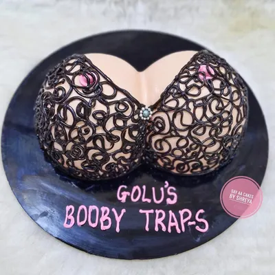 I believe celebrations should be fun and fearless, which is why I love making naughty bachelorette cakes. This "Booby Traps" design is a playful and popular choice for bridal showers, bringing a bit of cheeky humor to the party.