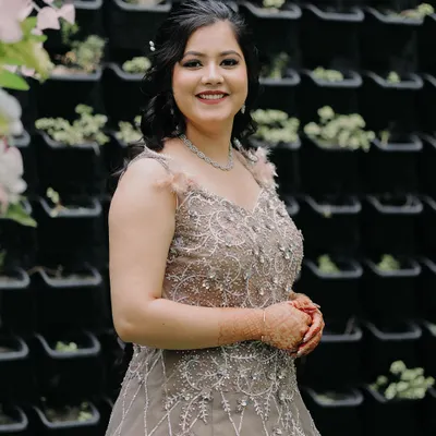 A beautiful, smiling portrait of the bride-to-be on her engagement day. Her genuine happiness shines through in this candid shot.