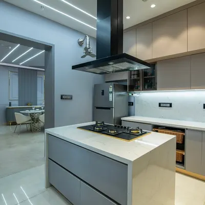This view shows how the kitchen opens up to the dining area, creating a wonderful flow for entertaining. The island serves as a natural gathering spot, with the hob facing guests so the cook is always part of the conversation.