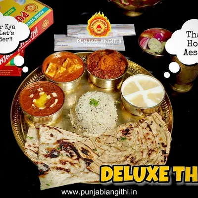 When you think of a thali, think of my Deluxe Thali. It's a complete meal with paneer, dal, rice, breads, and raita. Why wait, let's order!