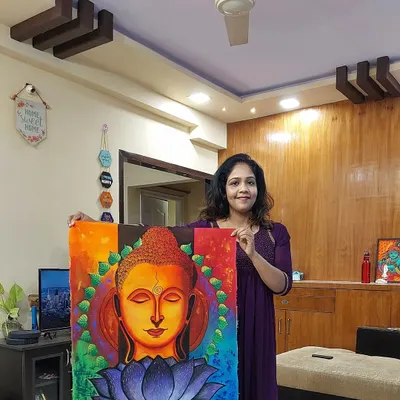 I am holding one of my finished Buddha paintings, created to bring a sense of peace and serenity into your home. This large 24x31 inch canvas features vibrant colors and a calming presence, making it a wonderful centerpiece for any room.
