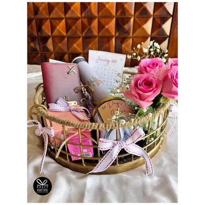 Counting down to a special day? I created this '30 days to go' hamper for a client's wedding countdown, featuring a personalized calendar, passport holder, and other goodies.