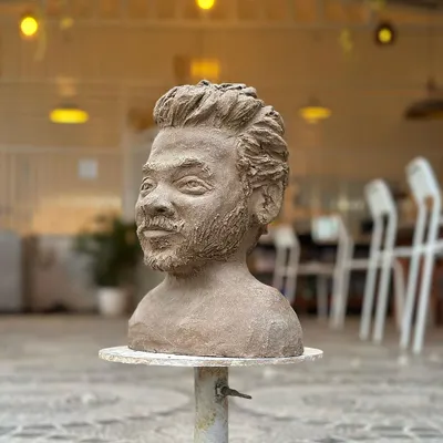 A portrait in clay. This expressive bust, sculpted from raw terracotta, captures a likeness with incredible texture and detail. Sculpting a face is a journey of patience and observation.