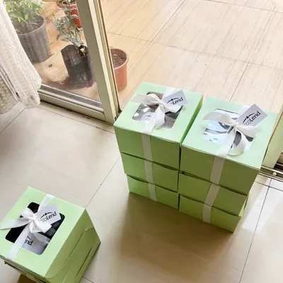 The satisfaction of seeing perfectly bow-tied hampers ready for dispatch. This image shows our commitment to on-time and on-point delivery for all corporate orders.