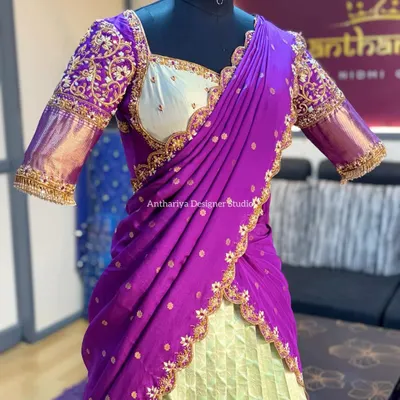 A mannequin shot of the light green and purple langa voni, focusing on the sweetheart neckline and embroidered blouse.