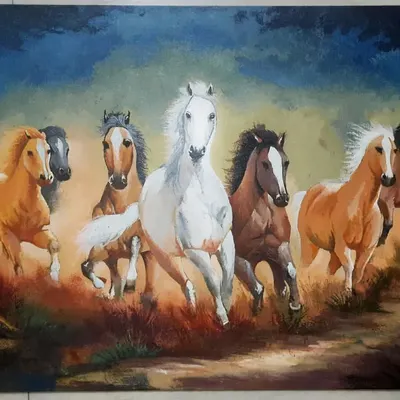 This is a large 1.5 by 2 feet acrylic painting of seven running horses, a powerful symbol in Vastu. I used bold colors and dynamic strokes to create a sense of energy and movement, making it a statement piece for any home.