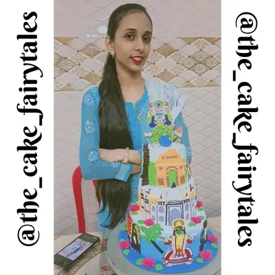 This is me with my India-themed cake that won first prize at the Hunarmand 2 baking competition. I am so proud to have represented our country's culture through my baking.