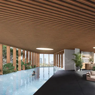 A rendering of an indoor swimming pool for a mid-rise coastal residence in Mumbai. A slatted wood ceiling and large openings to planters create a tranquil, light-filled space with views of the city.