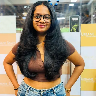 A perfect example of our layered haircut, styled with an inward curl to create volume and a beautifully framed face. This is a classic, stylish look.