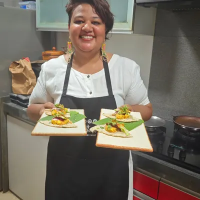 Ready to serve. Here I am with freshly plated appetizers for my 'Country Roads' supper club, where I share dishes inspired by my travels.