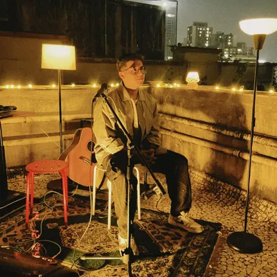 Sometimes, the best shows are the most intimate ones. Here I am, set up for a solo acoustic performance on a rooftop. This is perfect for private parties or cozy cafe gigs where the music can be front and center.
