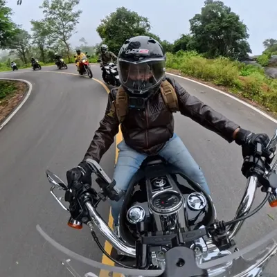 This photo perfectly illustrates our core principle: lane discipline. Following our lead rider in a staggered formation ensures a safe and organized group motorcycle tour.