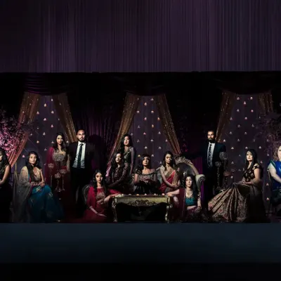 A grand, painterly family portrait. I love arranging and lighting group photos to look like a classic piece of art, ensuring everyone looks their best in a formal setting.