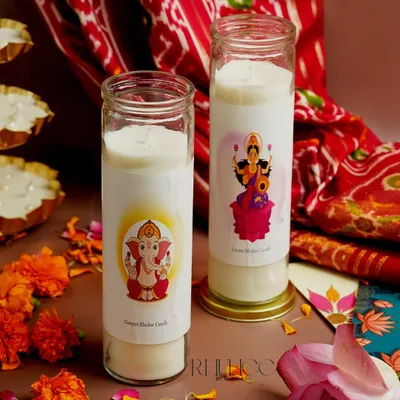 My Ganpati and Laxmi Ruhee Candles are crafted to bring prosperity and peace into your home. The tall glass jars feature beautiful illustrations, making them perfect for your puja or as a spiritual gift.