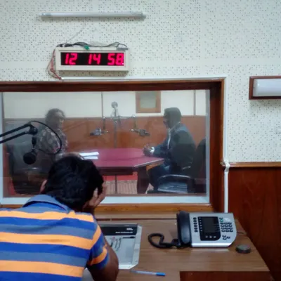 During an interview at a radio station, where I had the opportunity to talk about my passion for swimming and coaching. I love sharing the importance of swimming and water safety with a wider audience.