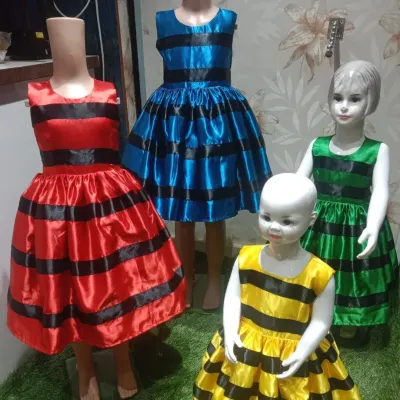 A set of shiny satin balloon frocks with black ribbon details, available in multiple colors for a vibrant group performance.